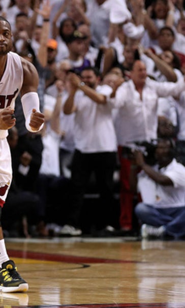 Wade gets 30, Heat rally and beat Raptors 94-87 in OT